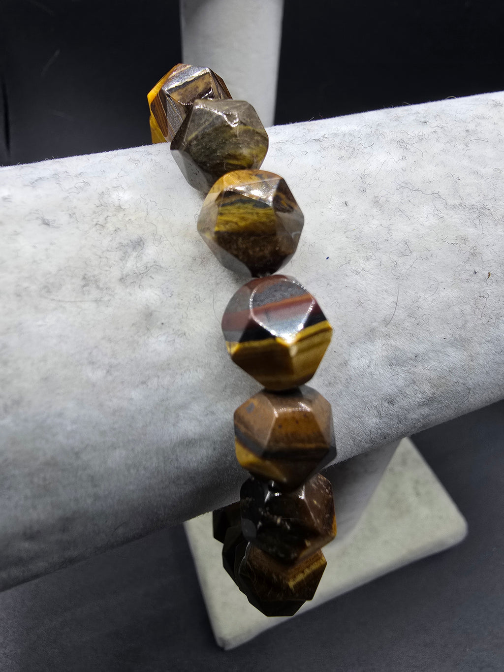 This is a Faceted Tiger Eye Bracelet