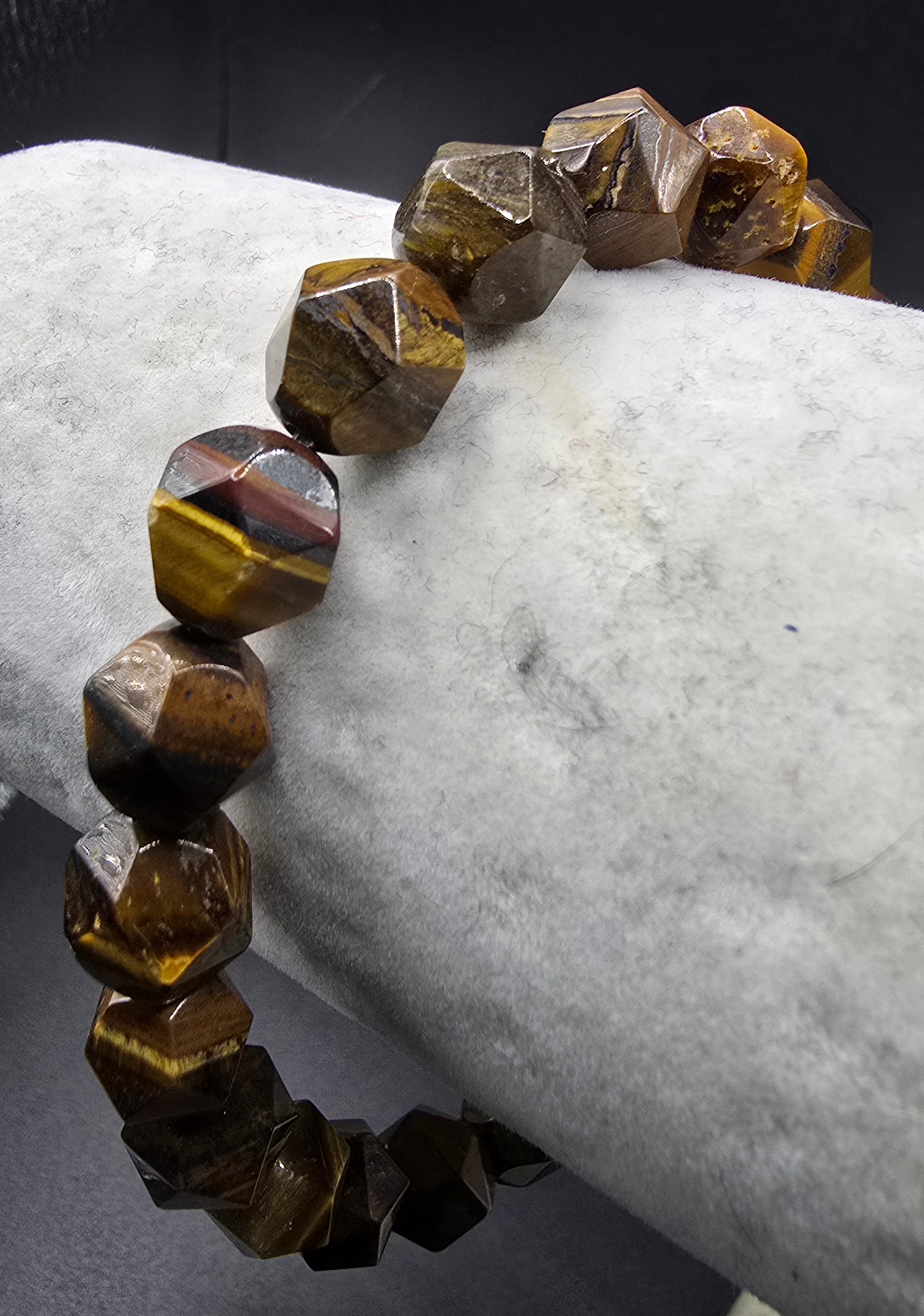 This is a Faceted Tiger Eye Bracelet